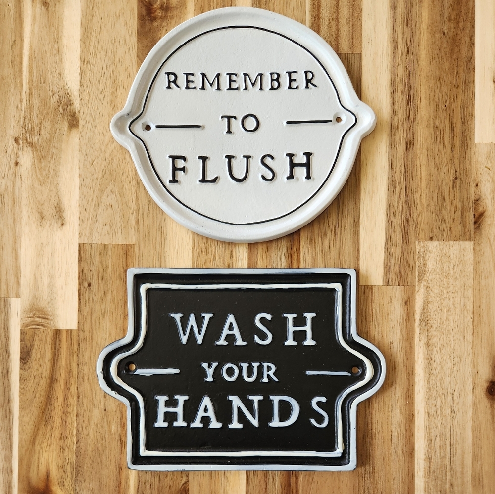Two bathroom signs from Hearth & Hand with Magnolia by Joanna Gaines